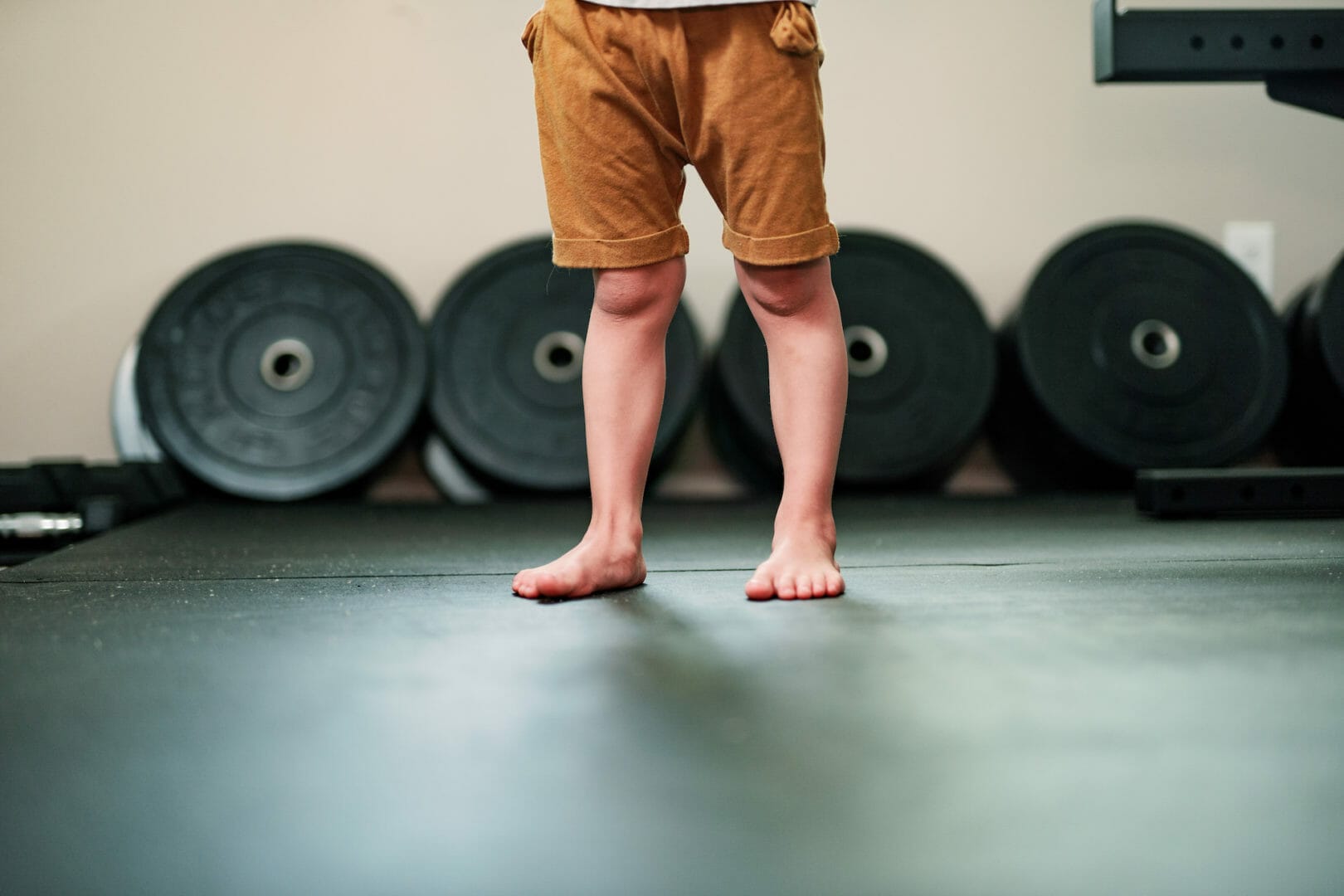 Closeup kid legs on training at LFT GYM