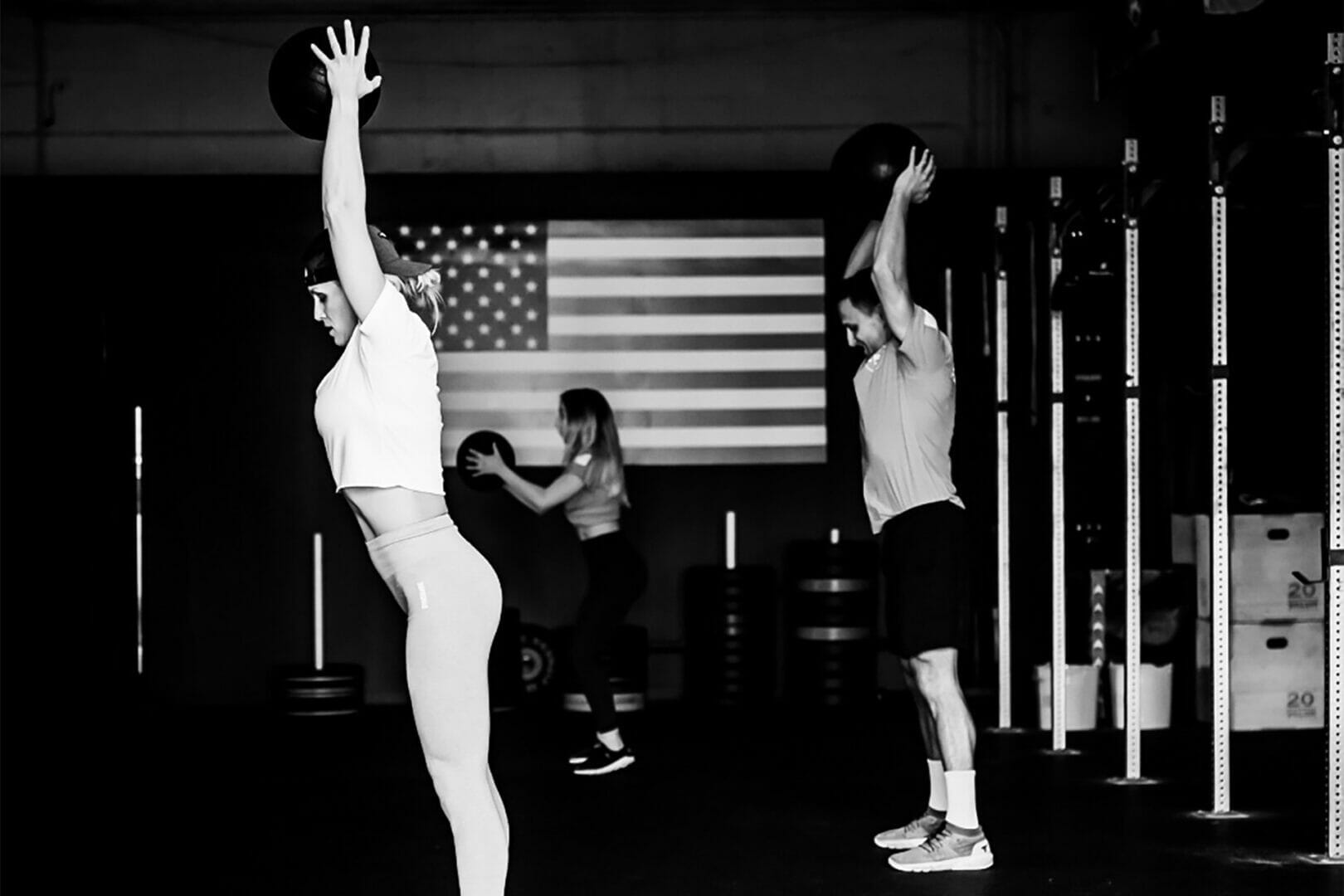 People training with heavy training balls at LFT GYM